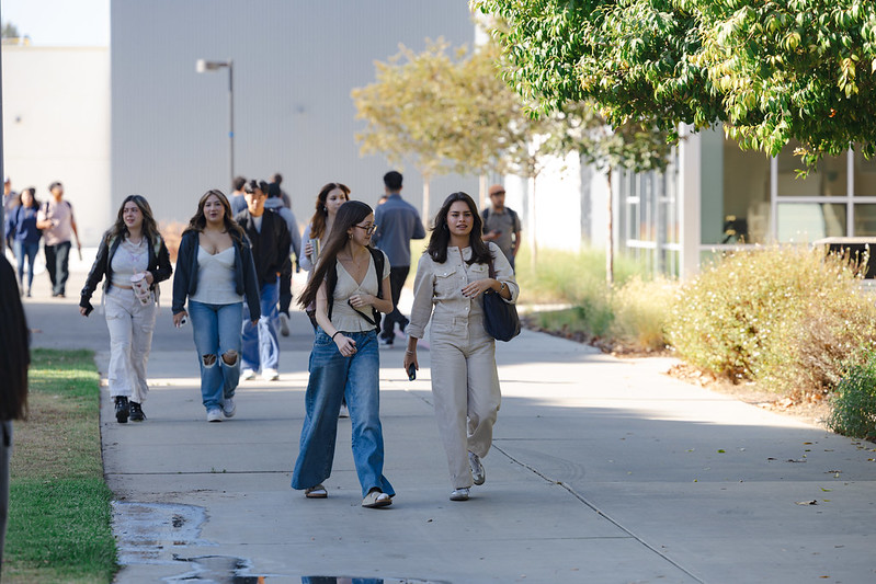 Student walk outside on the campus of Allan Hancock College.