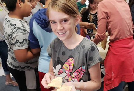 young girl in cooking class