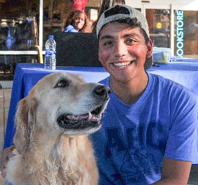 Gimme A Break event, CAN Scholar with a therapy dog