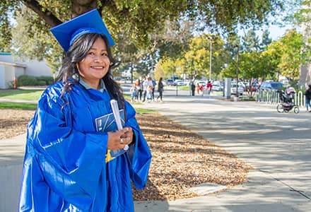 Woman in graduation robe