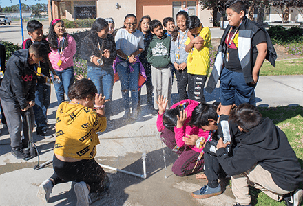 Teacher with young children