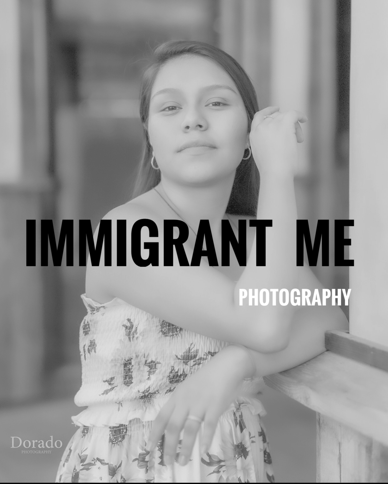 A photo of a woman posed and glancing off in the distance from the immigrant me exhibit