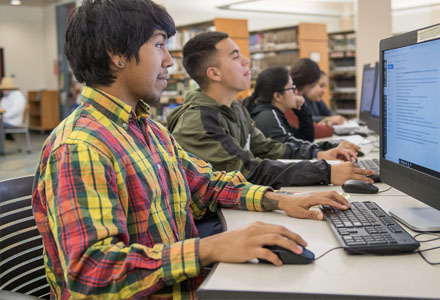 men sitting at computers