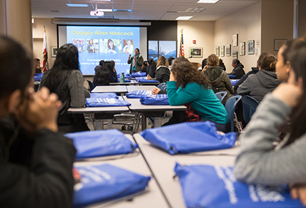 Students watching a presentation