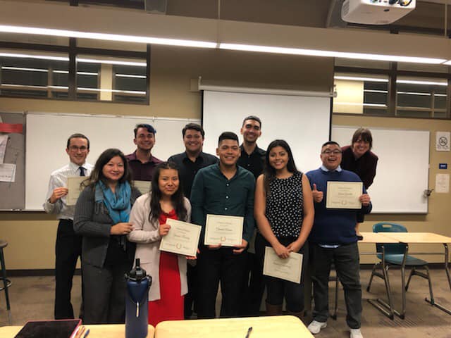 AHC Spanish Debate Team holding certificates