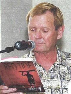 Miller reading from a book